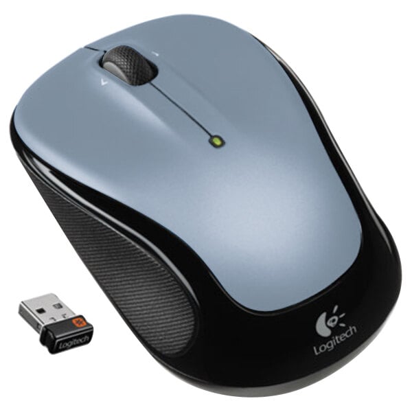 A Logitech silver wireless mouse next to a USB stick.