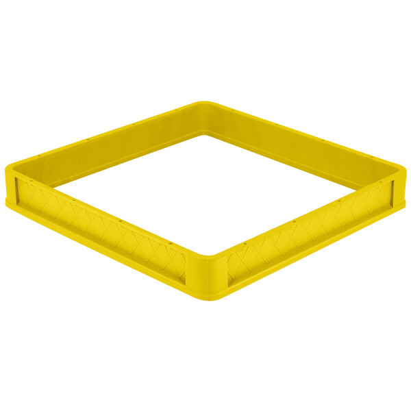 A yellow plastic Vollrath Traex extender with closed sides on a white background.