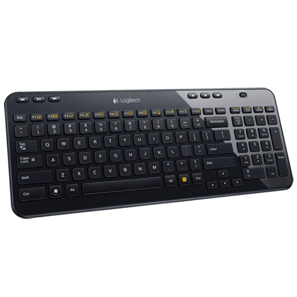 A Logitech K360 wireless black keyboard with white text.