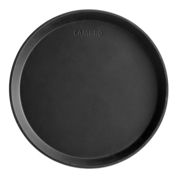 A black round Cambro non-skid serving tray with the word "Camo" on it.