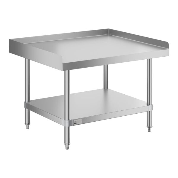 A stainless steel Advance Tabco equipment stand with a stainless steel undershelf.