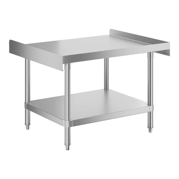 A stainless steel Advance Tabco equipment stand with a shelf.