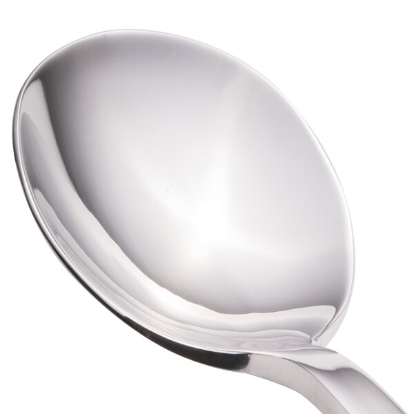 A close-up of a Walco stainless steel bouillon spoon with a silver handle.