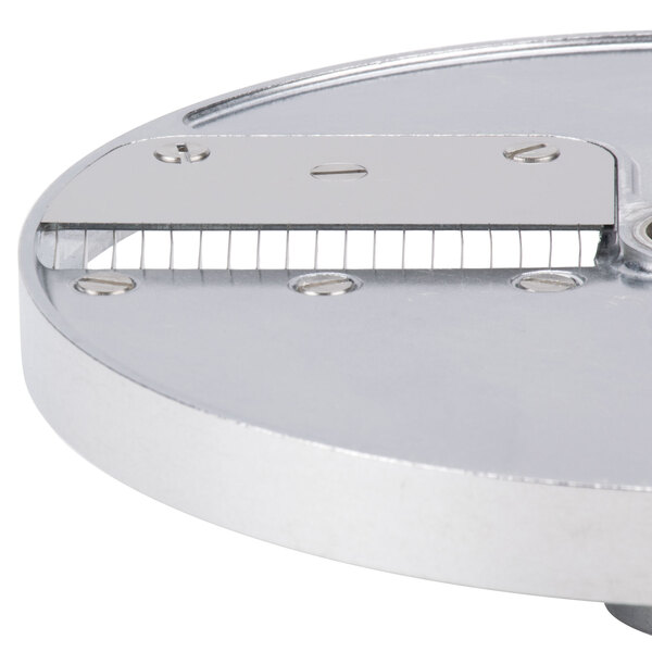 A Robot Coupe 16-disc set with circular metal plates and blades.