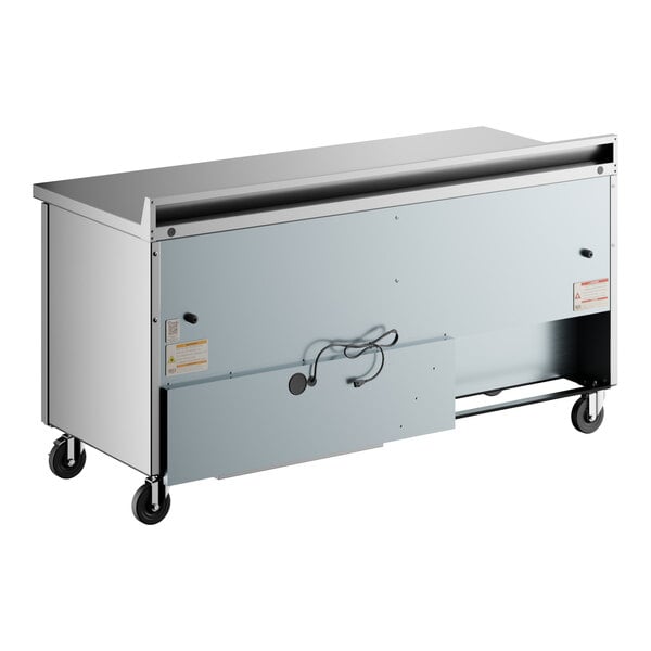 A True worktop refrigerator with a stainless steel top and sides.