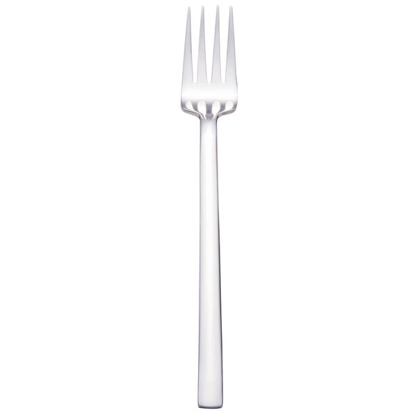A silver Walco 18/10 stainless steel table fork with a white handle.