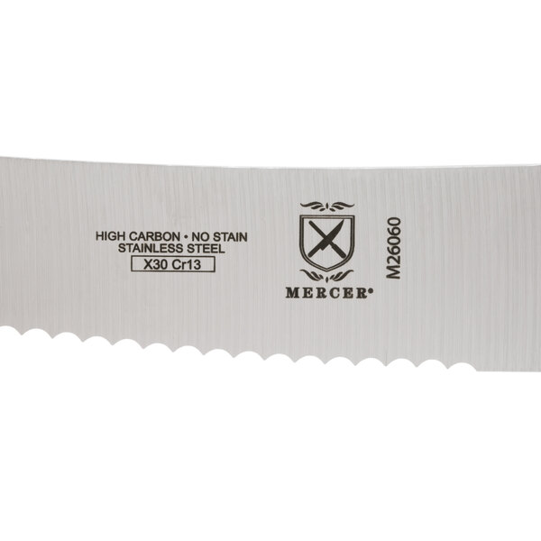 A Mercer Culinary Praxis curved bread knife with a wavy edge and a rosewood handle.