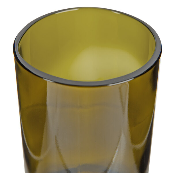 A Libbey wine tumbler made from a dark olive wine bottle with a brown base and green rim.