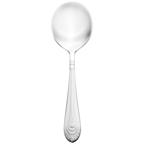 A close-up of a Walco stainless steel bouillon spoon with an Art Deco design on the handle.