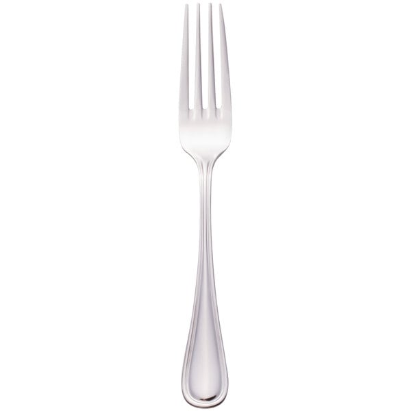 A close-up of a Walco Pacific Rim stainless steel dinner fork with a silver handle.