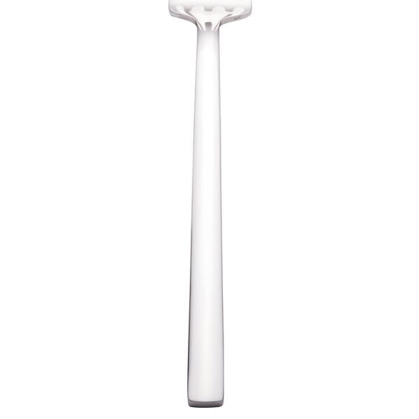 The Walco Erik stainless steel dinner fork with a white cylindrical object with a black top.
