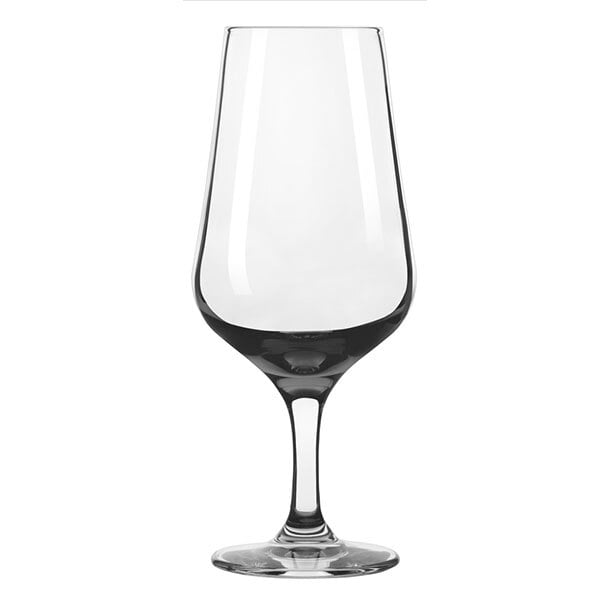 A close-up of a clear Libbey wine taster glass.