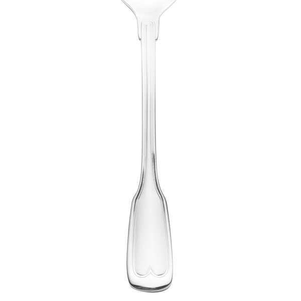 A close-up of a Walco Luxor stainless steel serving spoon with a handle.