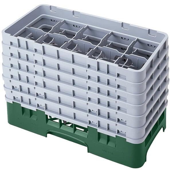 A white and green plastic Cambro glass rack with 10 compartments and 6 extenders.
