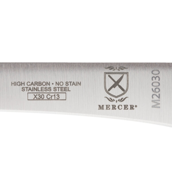A close-up of a Mercer stainless steel boning knife with a rosewood handle.