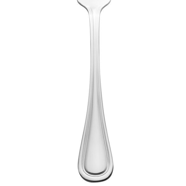 A Walco stainless steel salad fork with a white handle.