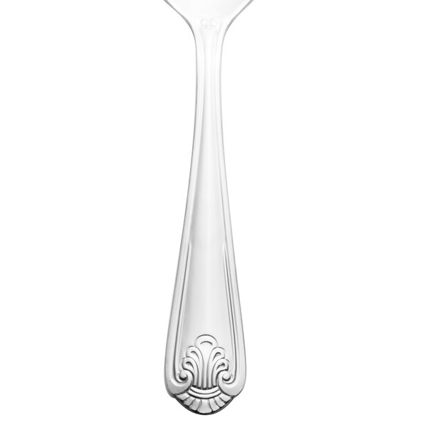 A Walco stainless steel bouillon spoon with a design on the handle.