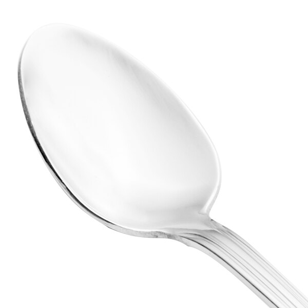 A close-up of a Walco stainless steel iced tea spoon with a silver handle.