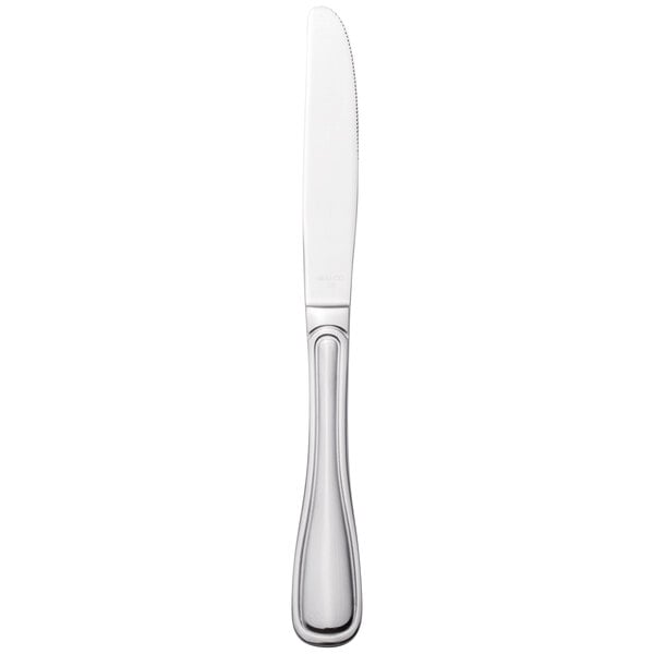 A silver Walco Saville dinner knife.