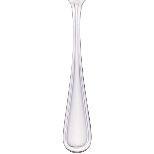 A close-up of a Walco stainless steel bouillon spoon.