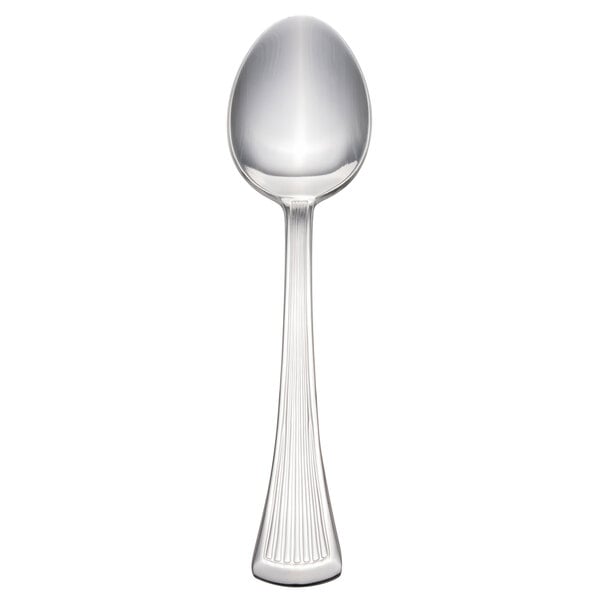 A close-up of a Walco Bosa Nova stainless steel dessert spoon with a white background.