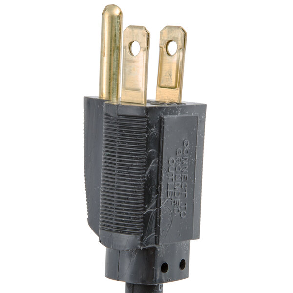 A black and gold electrical plug on a white background.
