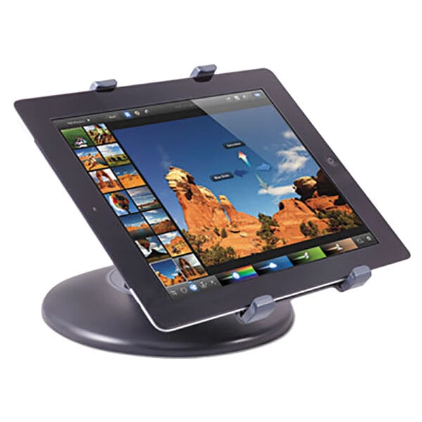 A Kantek black swivel base tablet stand holding a tablet on a counter.