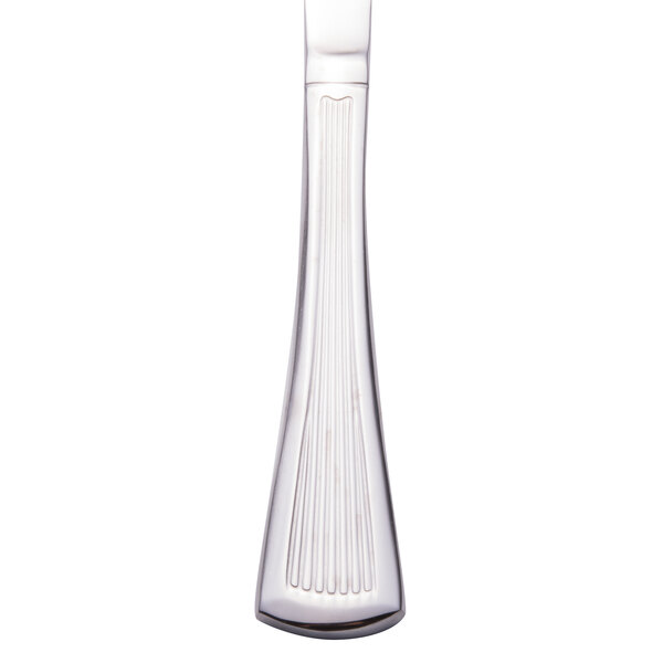 A close-up of a Walco Bosa Nova stainless steel dinner knife with a white background.