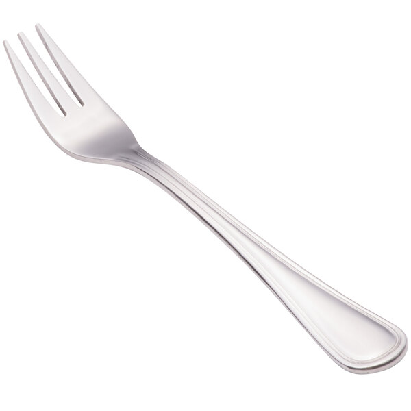 A close-up of a Walco stainless steel cocktail fork with a silver handle.