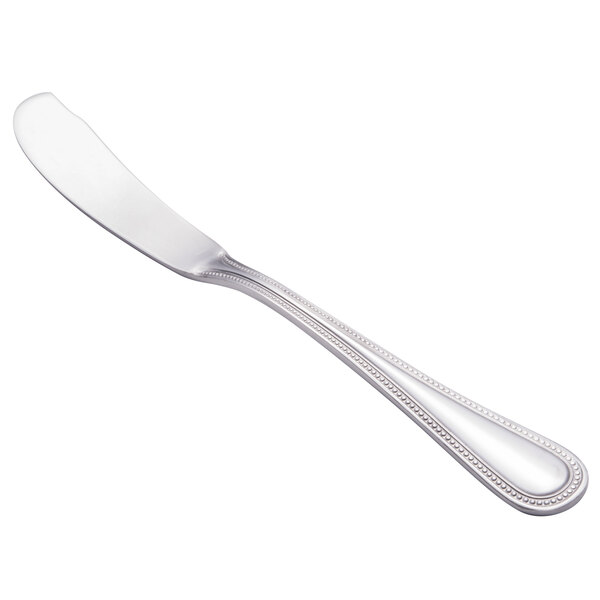 A Walco stainless steel butter spreader with a handle.