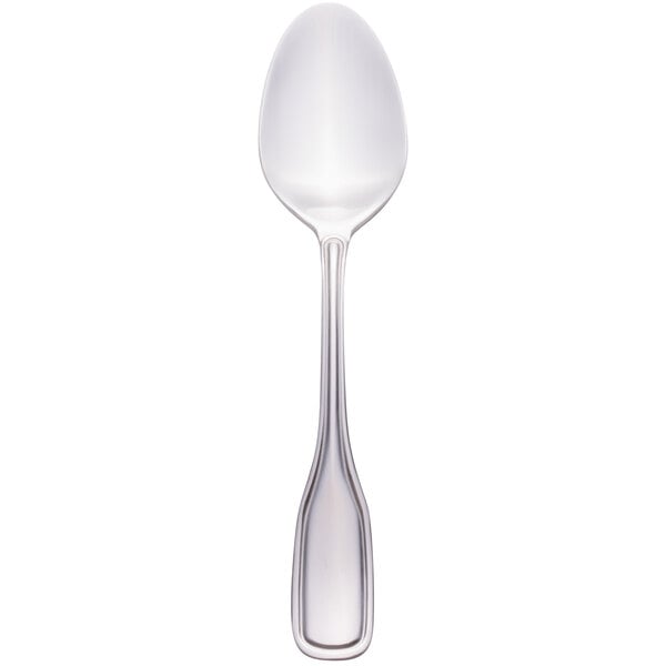 A Walco stainless steel teaspoon with a silver handle and round top on a white background.