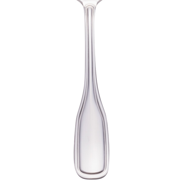 A Walco heavy weight stainless steel teaspoon with a long handle.