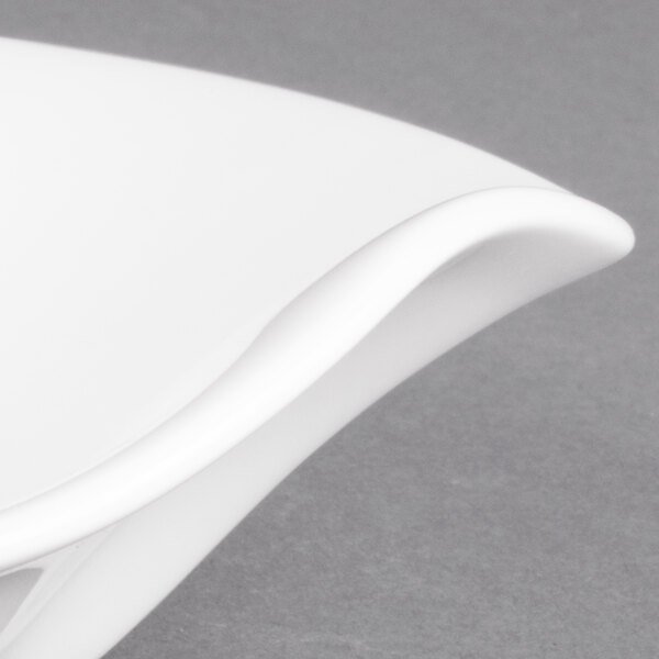 A white Villeroy & Boch porcelain deep bowl with a curved edge.