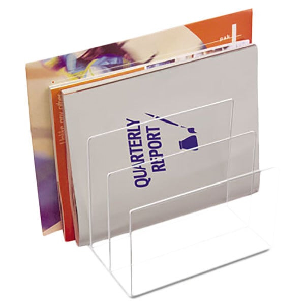 A Kantek clear acrylic file sorter with three sections holding magazines.