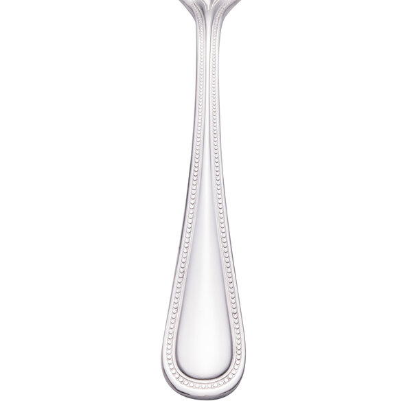 A Walco stainless steel dinner fork with a beaded design on the handle.