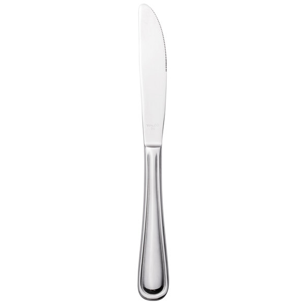 A close-up of a silver Walco Balance dinner knife with black edges on a white background.