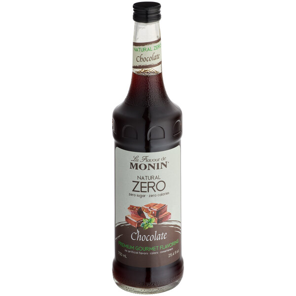A bottle of Monin zero calorie chocolate flavoring syrup with a white label.