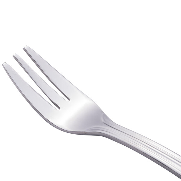 A close-up of a Walco stainless steel cocktail fork with a silver handle.