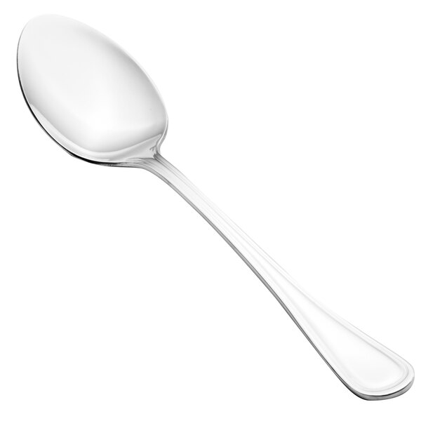 A close-up of a Walco Marcie stainless steel serving spoon with a silver handle.