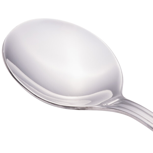 A close-up of a Walco stainless steel bouillon spoon with a silver handle.