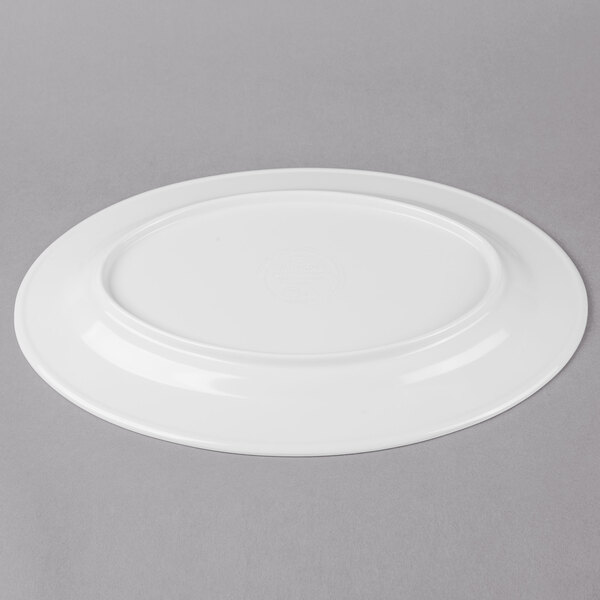 A white Thunder Group oval melamine platter with a white rim.