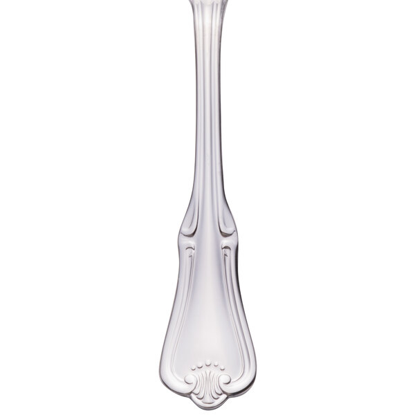 A Walco stainless steel teaspoon with a handle.