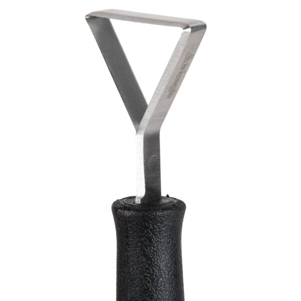A close-up of a black and silver Triangle Decorator knife with a metal handle.
