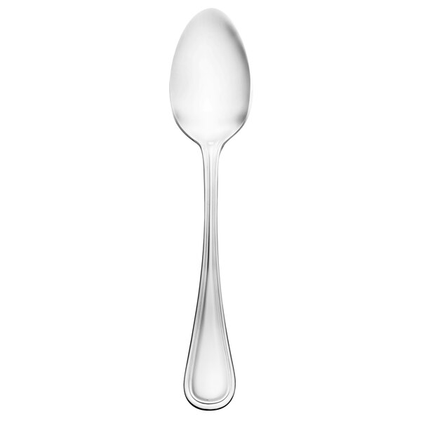 A Walco stainless steel dessert spoon with a silver handle on a white background.