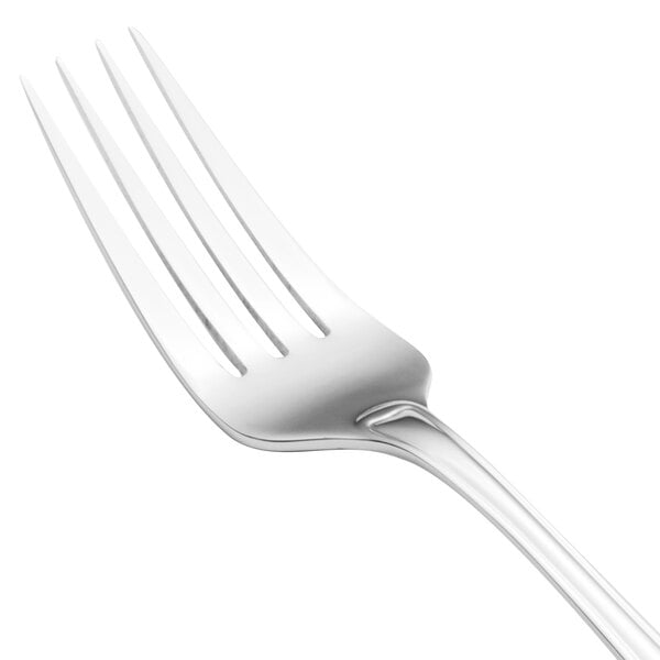 A close-up of a Walco stainless steel dinner fork with a silver handle.