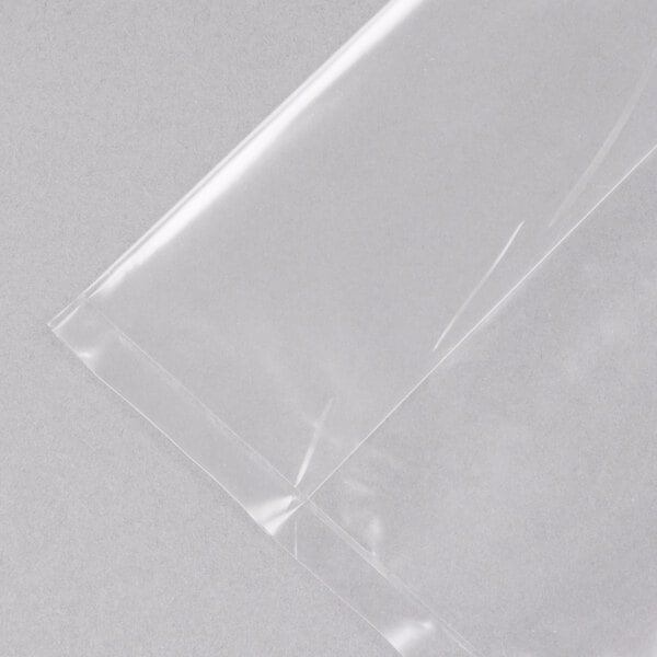 A clear plastic bag on a white surface with the Inteplast Group logo.