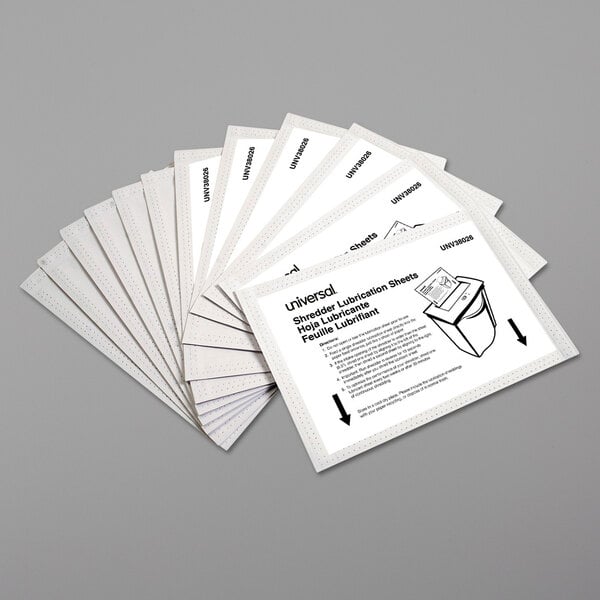 A stack of white Universal Shredder Lubricant Sheets.