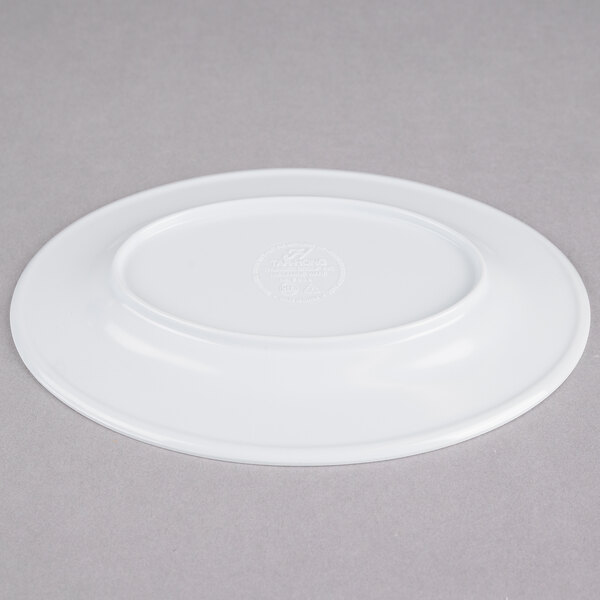 A white Thunder Group oval melamine platter on a gray surface.