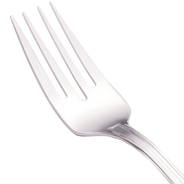 A close-up of the silver Walco Barony salad fork.