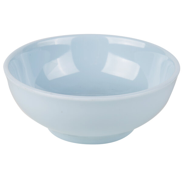 A light blue Thunder Group Blue Jade melamine bowl with a white rim.